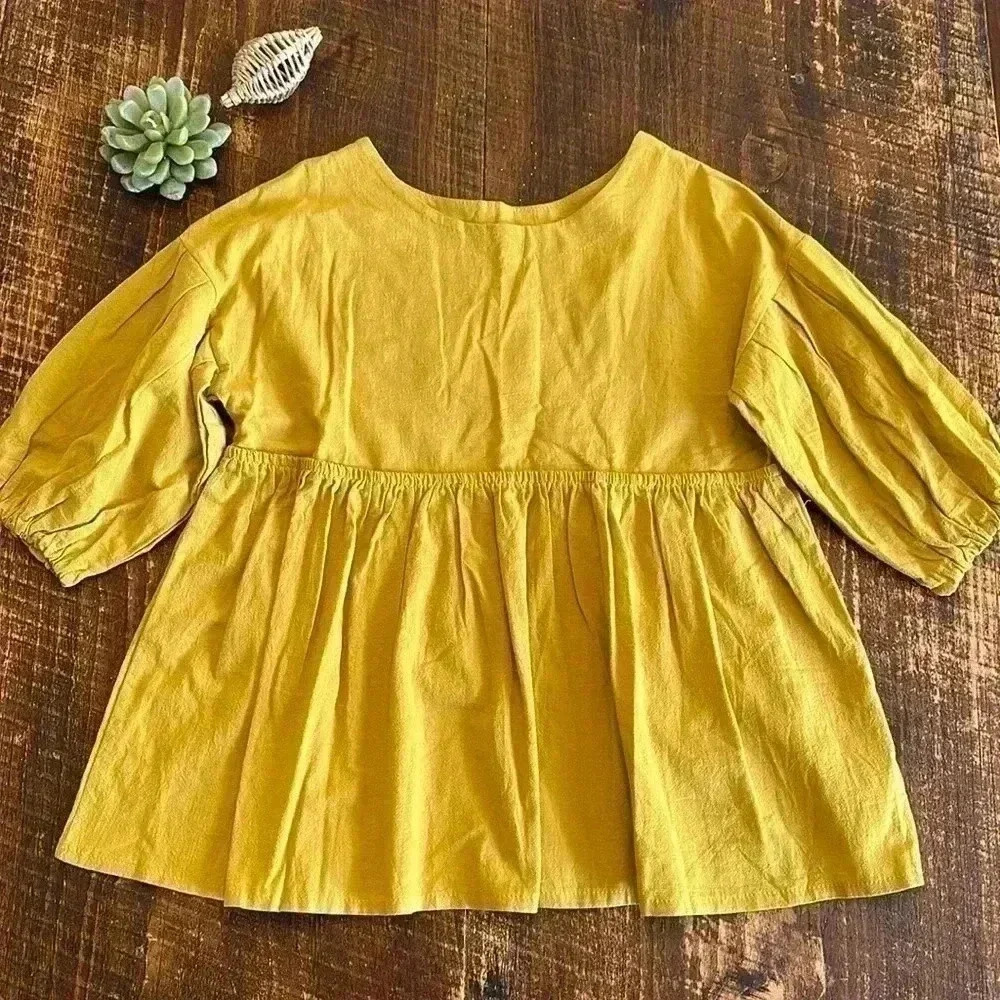 Cellabie | NWT - Mustard Yellow Peplum Top